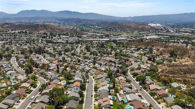 23208 Cuervo Dr, Valencia, CA 91354 - aerial overview of property's location with mountains and nearby suburban area