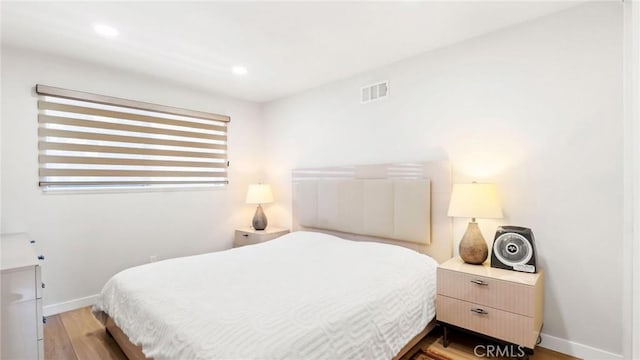 23208 Cuervo Dr, Valencia, CA 91354 - bedroom with wood finished floors and recessed lighting