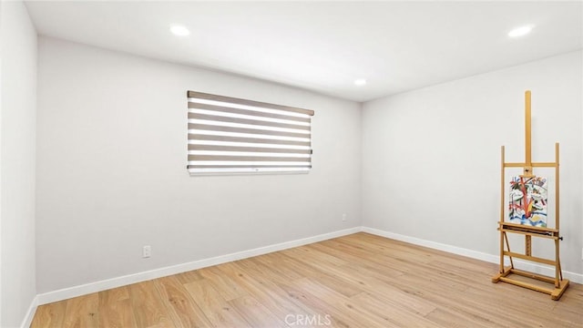 23208 Cuervo Dr, Valencia, CA 91354 - unfurnished room with wood finished floors and recessed lighting