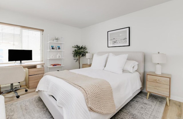 4600 Lamont St Unit 106, San Diego, CA 92109 - bedroom featuring light wood-type flooring and a desk