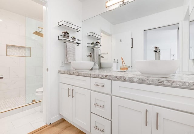 4600 Lamont St Unit 106, San Diego, CA 92109 - bathroom with double vanity and walk in shower