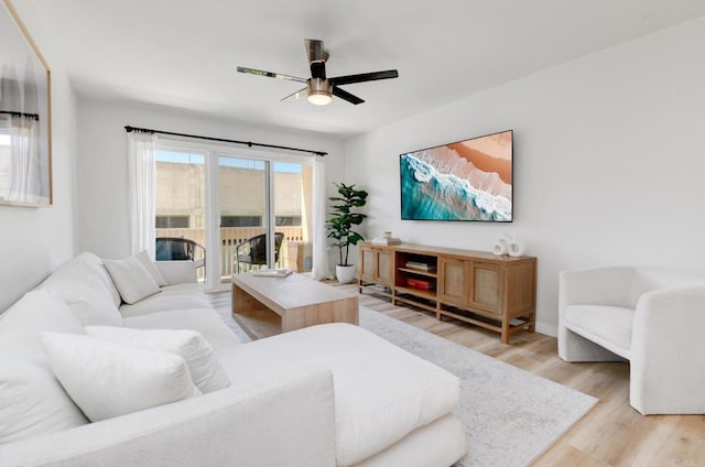 4600 Lamont St Unit 106, San Diego, CA 92109 - living area with light wood finished floors and ceiling fan