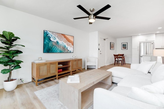 4600 Lamont St Unit 106, San Diego, CA 92109 - living area with light wood finished floors, a ceiling fan, and recessed lighting