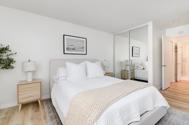 4600 Lamont St Unit 106, San Diego, CA 92109 - bedroom featuring light wood finished floors and a closet