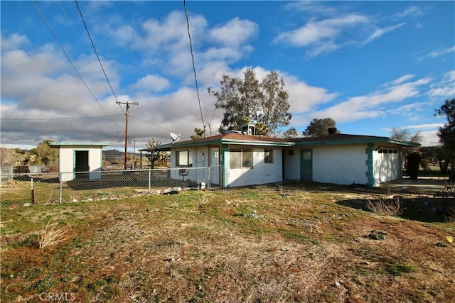 57136 Navajo Trl, Yucca Valley, CA 92284 - back of property featuring an attached garage
