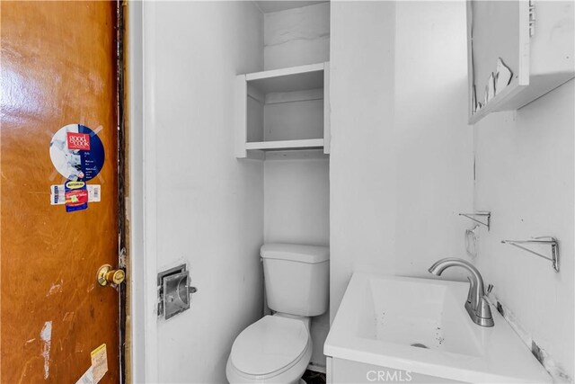 57136 Navajo Trl, Yucca Valley, CA 92284 - bathroom with toilet and a sink