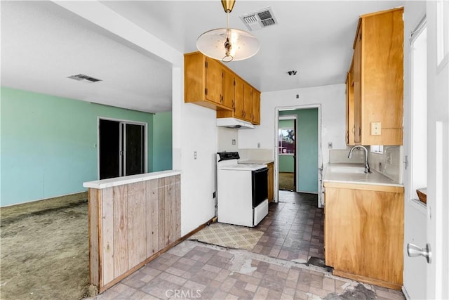 57136 Navajo Trl, Yucca Valley, CA 92284 - kitchen featuring electric stove, light countertops, under cabinet range hood, brick patterned floors, and brown cabinetry