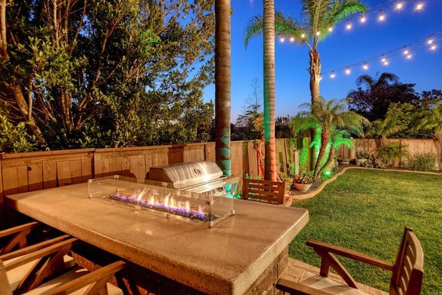 13748 Torrey Glenn Rd, San Diego, CA 92129 - wooden terrace with an outdoor fire pit, a fenced backyard, and an outdoor kitchen