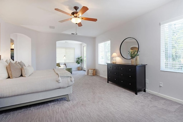 13748 Torrey Glenn Rd, San Diego, CA 92129 - bedroom featuring arched walkways, carpet flooring, and ceiling fan