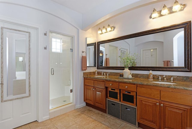 13748 Torrey Glenn Rd, San Diego, CA 92129 - full bath with a shower stall, double vanity, and tile patterned floors