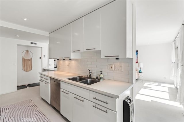 1230 Horn Ave Unit 101, West Hollywood, CA 90069 - kitchen with dishwasher, white cabinets, decorative backsplash, light countertops, and modern cabinets