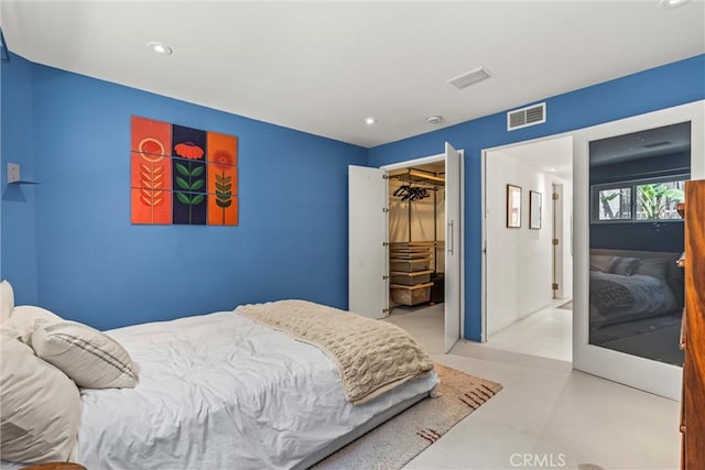 1230 Horn Ave Unit 101, West Hollywood, CA 90069 - bedroom featuring recessed lighting, concrete floors, a spacious closet, and a closet