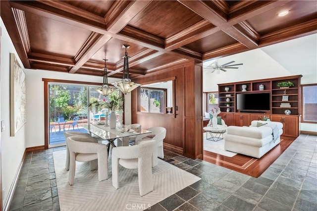 9 Aberdeen St, Irvine, CA 92620 - dining space with stone tile flooring, a ceiling fan, coffered ceiling, beam ceiling, and crown molding