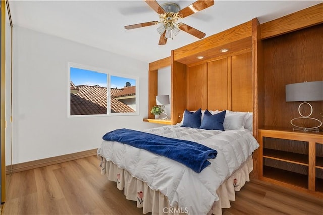 9 Aberdeen St, Irvine, CA 92620 - bedroom with wood finished floors and ceiling fan