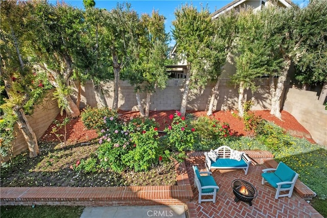 9 Aberdeen St, Irvine, CA 92620 - fenced backyard with an outdoor fire pit and a patio area