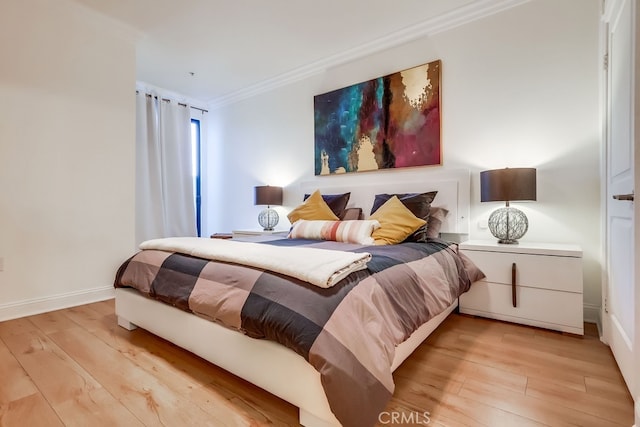 6938 Laurel Canyon Blvd Unit 101, North Hollywood, CA 91605 - bedroom featuring light wood finished floors and ornamental molding