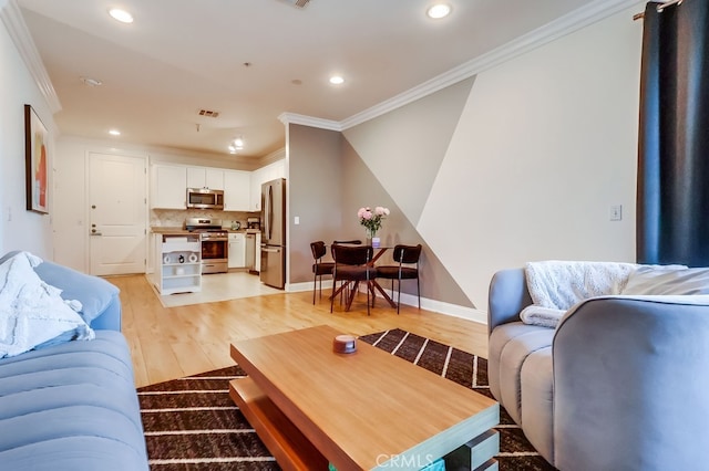 6938 Laurel Canyon Blvd Unit 101, North Hollywood, CA 91605 - living room with crown molding, recessed lighting, and light wood-type flooring