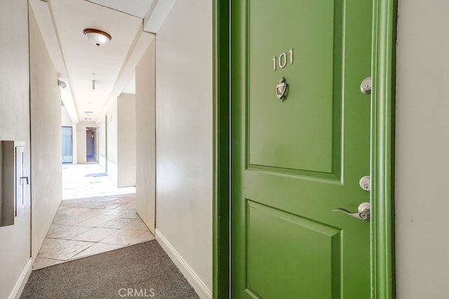 6938 Laurel Canyon Blvd Unit 101, North Hollywood, CA 91605 - hallway featuring baseboards and light carpet