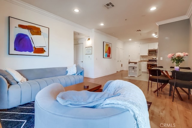 6938 Laurel Canyon Blvd Unit 101, North Hollywood, CA 91605 - living room with crown molding, recessed lighting, and light wood finished floors