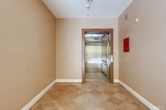 6938 Laurel Canyon Blvd Unit 101, North Hollywood, CA 91605 - unfurnished room with elevator and a pendent fire sprinkler