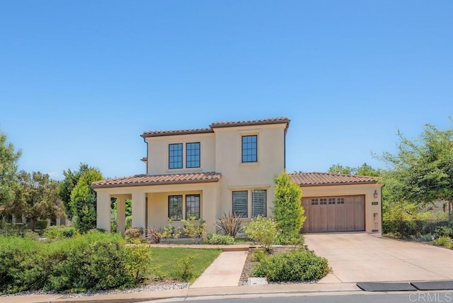 16210 Bluestar Way, San Diego, CA 92127 - mediterranean / spanish house with a tiled roof, a garage, stucco siding, and driveway