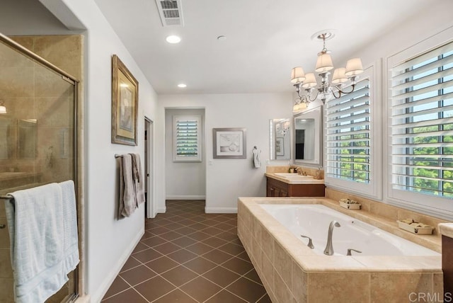 16210 Bluestar Way, San Diego, CA 92127 - bathroom with vanity, a shower stall, a garden tub, tile patterned floors, and a chandelier