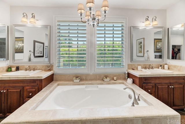 16210 Bluestar Way, San Diego, CA 92127 - bathroom featuring a garden tub, a chandelier, and two vanities