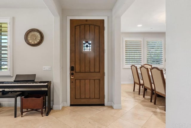 16210 Bluestar Way, San Diego, CA 92127 - foyer with baseboards and light tile patterned floors