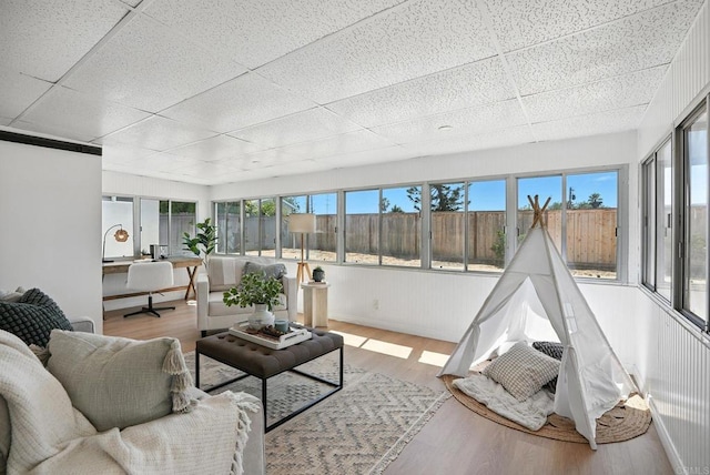 4862 Kesling Ct, San Diego, CA 92117 - sunroom / solarium with a paneled ceiling, wood finished floors, and healthy amount of natural light