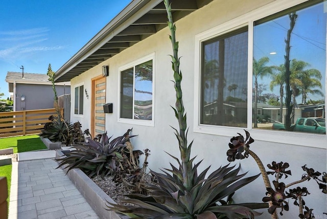 4862 Kesling Ct, San Diego, CA 92117 - view of side of home featuring stucco siding