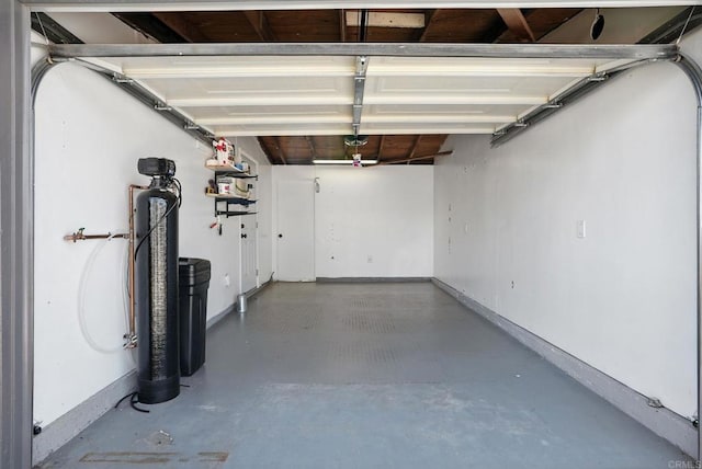 4862 Kesling Ct, San Diego, CA 92117 - garage featuring baseboards