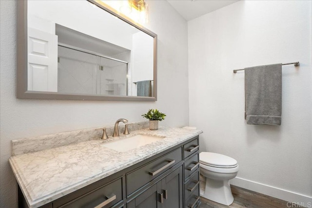 1879 Falconer Ct, Vista, CA 92081 - bathroom with wood finished floors, vanity, and a shower