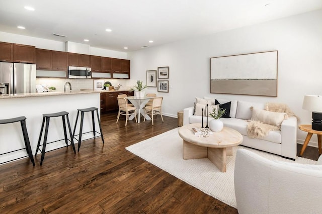 10667 Golden Willow Unit 152, San Diego, CA 92130 - living room featuring recessed lighting and dark wood finished floors