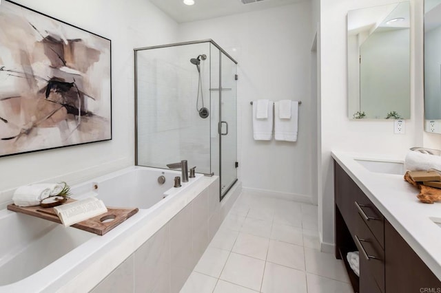 10667 Golden Willow Unit 152, San Diego, CA 92130 - bathroom featuring a garden tub, a shower stall, double vanity, tile patterned floors, and recessed lighting