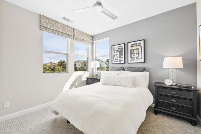 16755 Coyote Bush Dr Unit 15, San Diego, CA 92127 - bedroom featuring light carpet and a ceiling fan