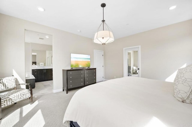 16755 Coyote Bush Dr Unit 15, San Diego, CA 92127 - bedroom with light carpet, ensuite bath, and recessed lighting