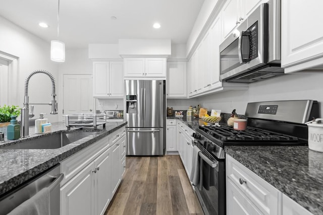 1925 Avenida Senecio Unit 2, Chula Vista, CA 91913 - kitchen featuring stainless steel appliances, white cabinetry, wood finished floors, and recessed lighting