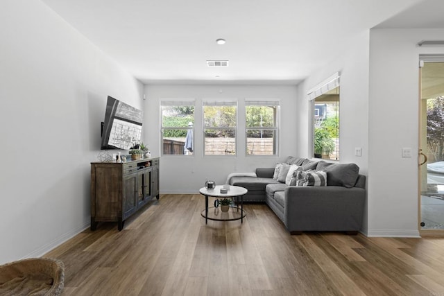 1925 Avenida Senecio Unit 2, Chula Vista, CA 91913 - living area featuring wood finished floors and baseboards
