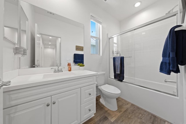 1925 Avenida Senecio Unit 2, Chula Vista, CA 91913 - bathroom featuring vanity, wood finished floors, bath / shower combo with glass door, and recessed lighting