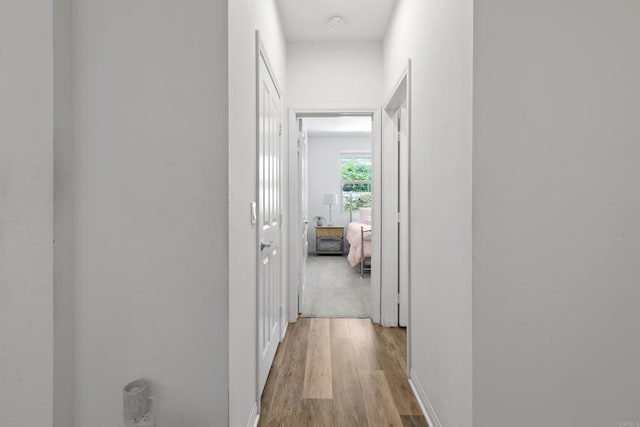 1925 Avenida Senecio Unit 2, Chula Vista, CA 91913 - corridor featuring light wood finished floors and baseboards