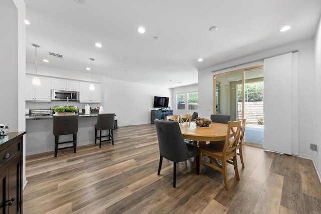 1925 Avenida Senecio Unit 2, Chula Vista, CA 91913 - dining area with wood finished floors and recessed lighting