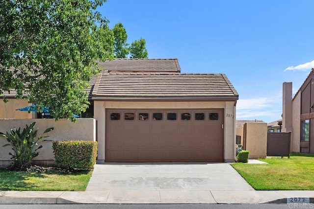 2072 Golden Circle Dr, Escondido, CA 92026 - view of front of home featuring a tile roof, driveway, a garage, and stucco siding