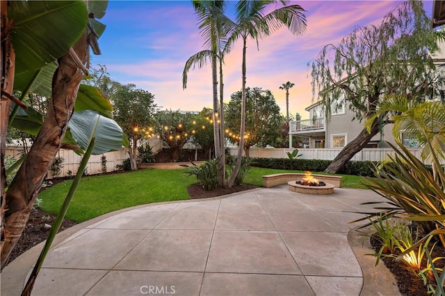 507 Corte Del Oro, San Clemente, CA 92673 - patio terrace at dusk with an outdoor fire pit and a patio area