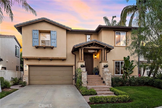 507 Corte Del Oro, San Clemente, CA 92673 - view of front of property with stucco siding, stone siding, concrete driveway, and an attached garage