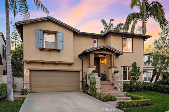 507 Corte Del Oro, San Clemente, CA 92673 - view of front facade with a garage, stucco siding, stone siding, and driveway