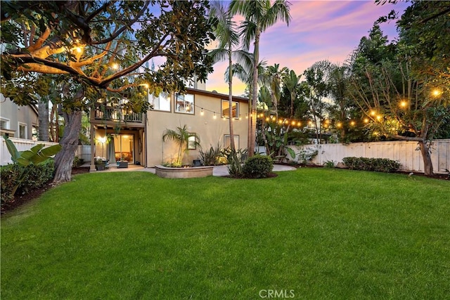 507 Corte Del Oro, San Clemente, CA 92673 - back of house at dusk featuring a balcony and stucco siding