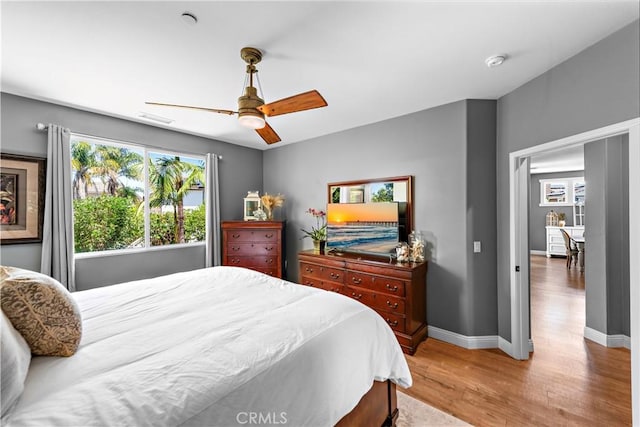 507 Corte Del Oro, San Clemente, CA 92673 - bedroom with light wood-type flooring and a ceiling fan