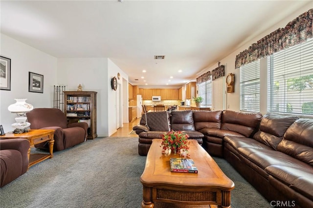 6411 Puma Pl, Rancho Cucamonga, CA 91737 - living area with recessed lighting and light colored carpet