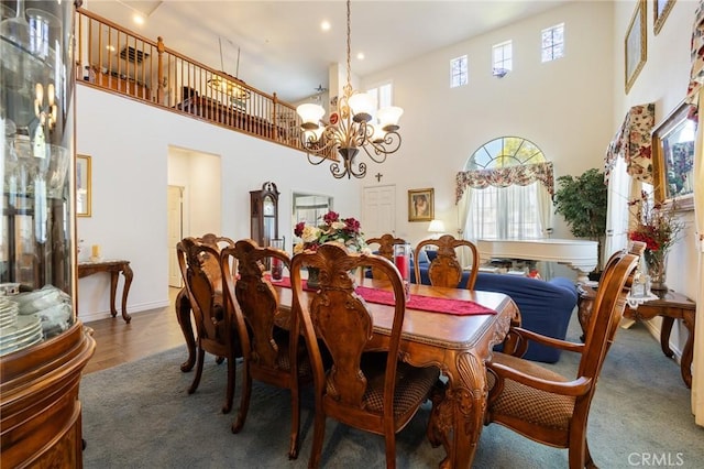 6411 Puma Pl, Rancho Cucamonga, CA 91737 - dining space featuring healthy amount of natural light, a towering ceiling, a chandelier, and recessed lighting