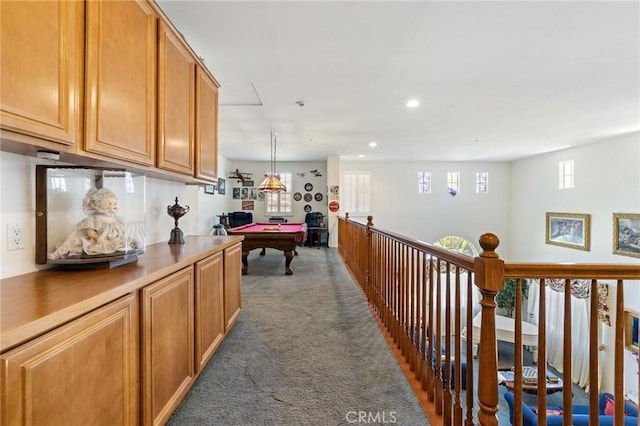 6411 Puma Pl, Rancho Cucamonga, CA 91737 - hallway with dark colored carpet, plenty of natural light, and recessed lighting